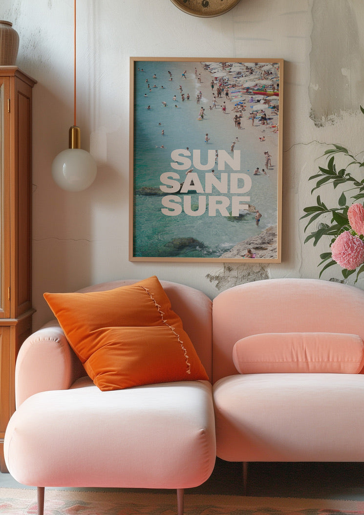 a pink couch sitting in a living room next to a clock