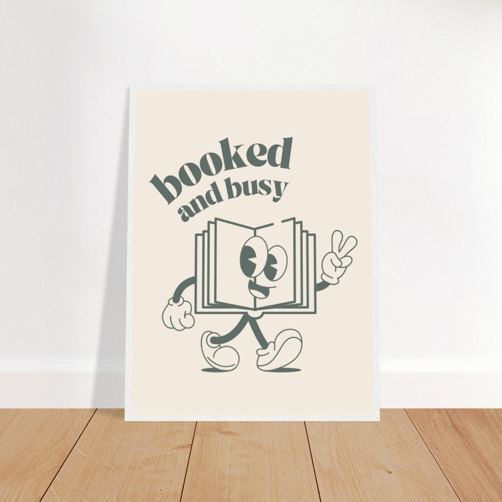 Booked and Busy with Premium Matte Paper Wooden Framed Poster. A wooden framed poster with the words "Booked and Busy" in a bold black font. The poster is printed on premium matte paper and has a clean, modern look.