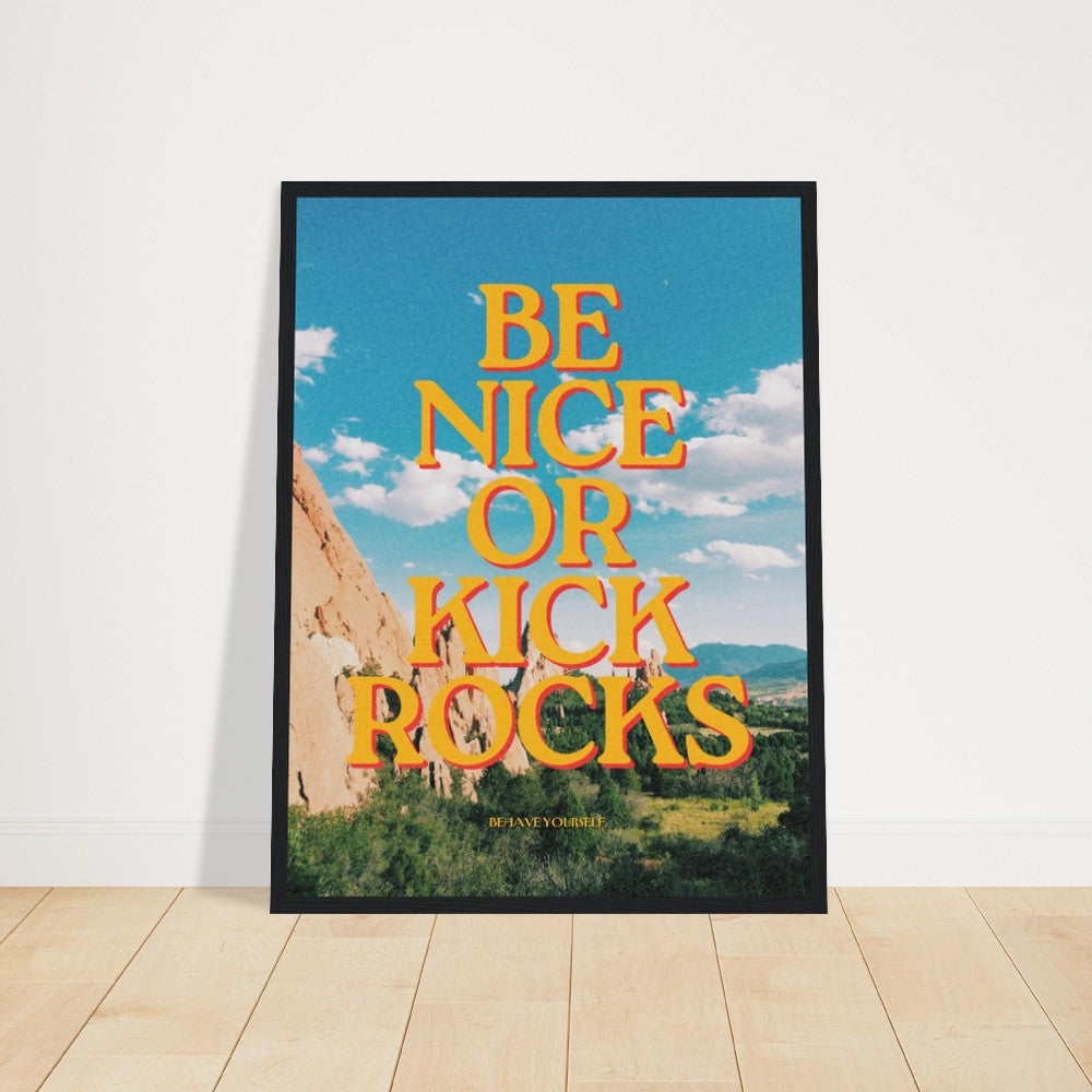 Wall art featuring the Be Nice or Kick Rocks message in a frame