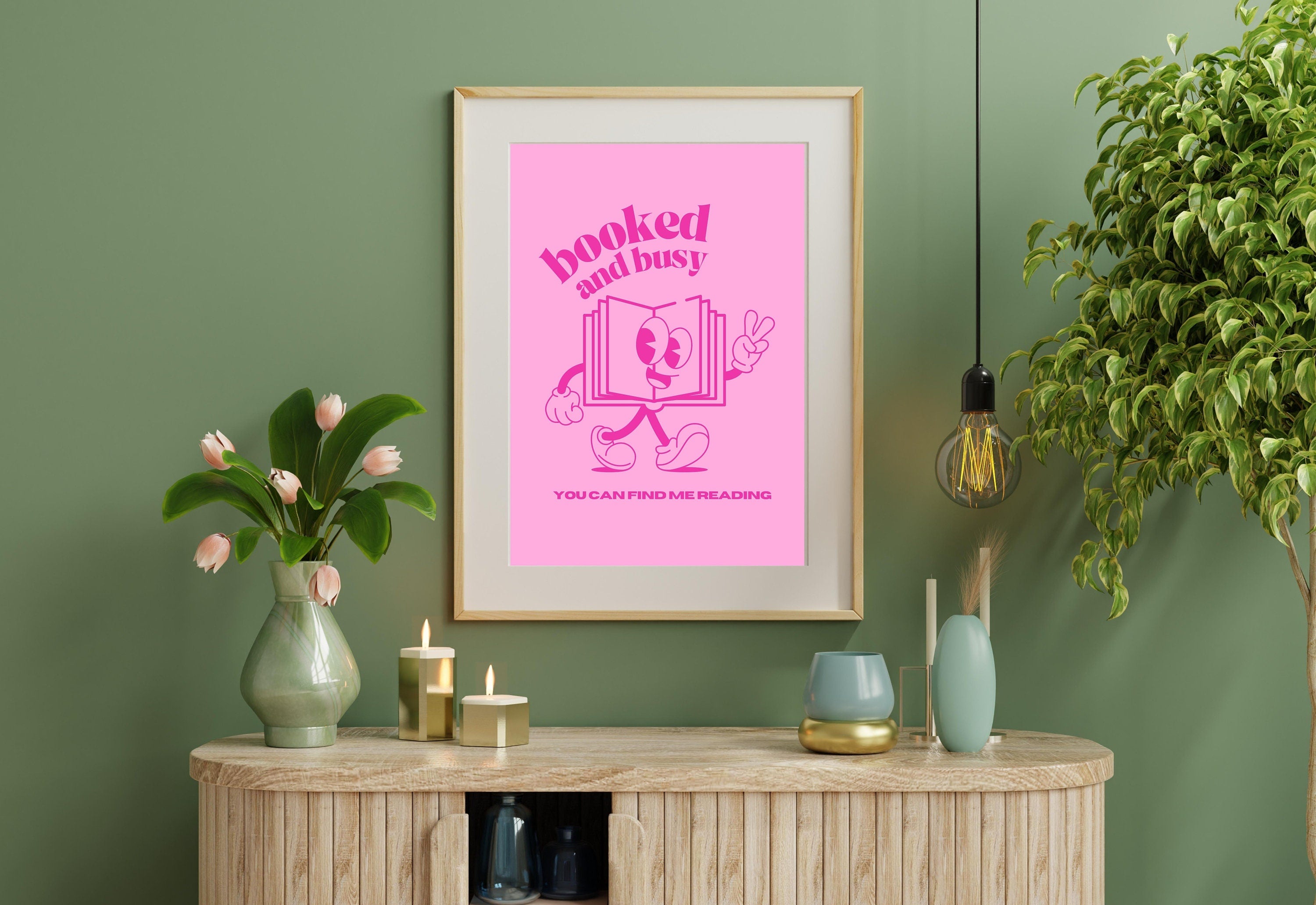 Hot pink digital art print with the words "Booked and Busy" written in a bold font